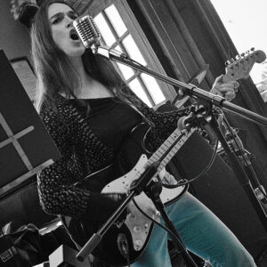 Catrin Lloyd-Bollard performs as CATFOX at the Castle Hotel, Aberystwyth, Wales; photo by Craig Kirkwood.