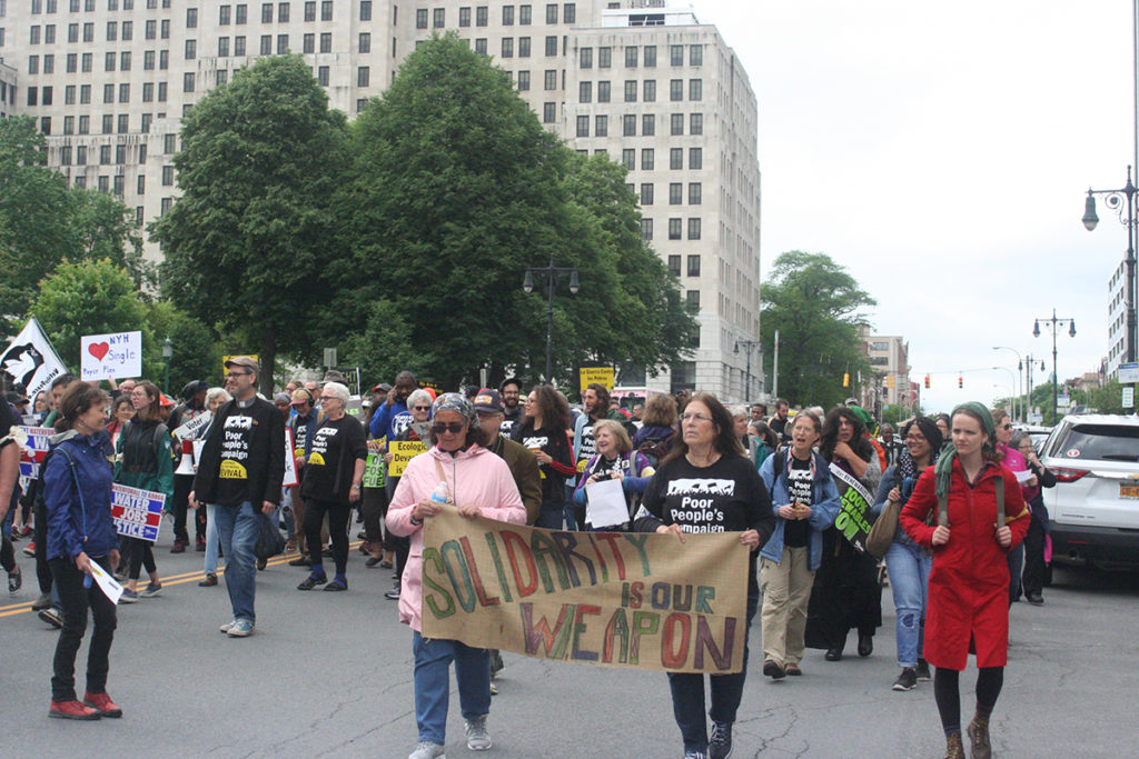 Demonstrators march down State Street to Lafayette Park in Albany, New York, June 4, 2018; photo by Jason Velázquez.