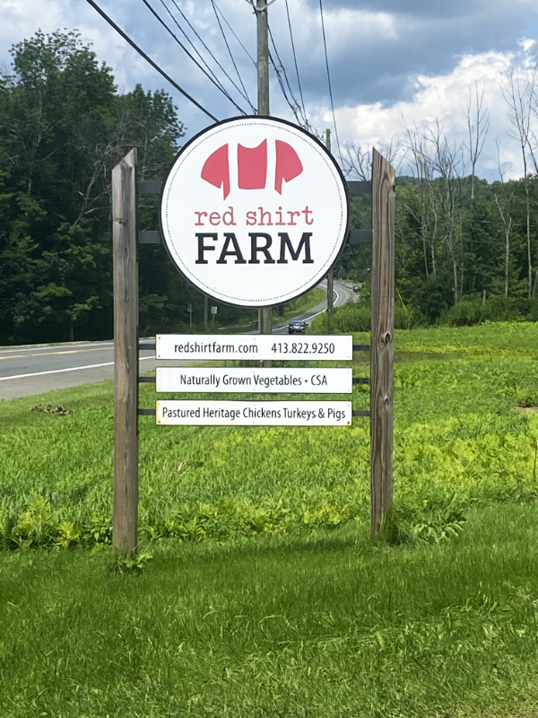 Photo of the road sign for Red Shirt Farm.