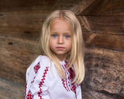 Photo of a blonde Ukrainian girl around seven years old.
