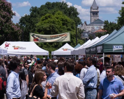 Shoppers and vendors at the USDA Farmers Market in Washington, D.C.