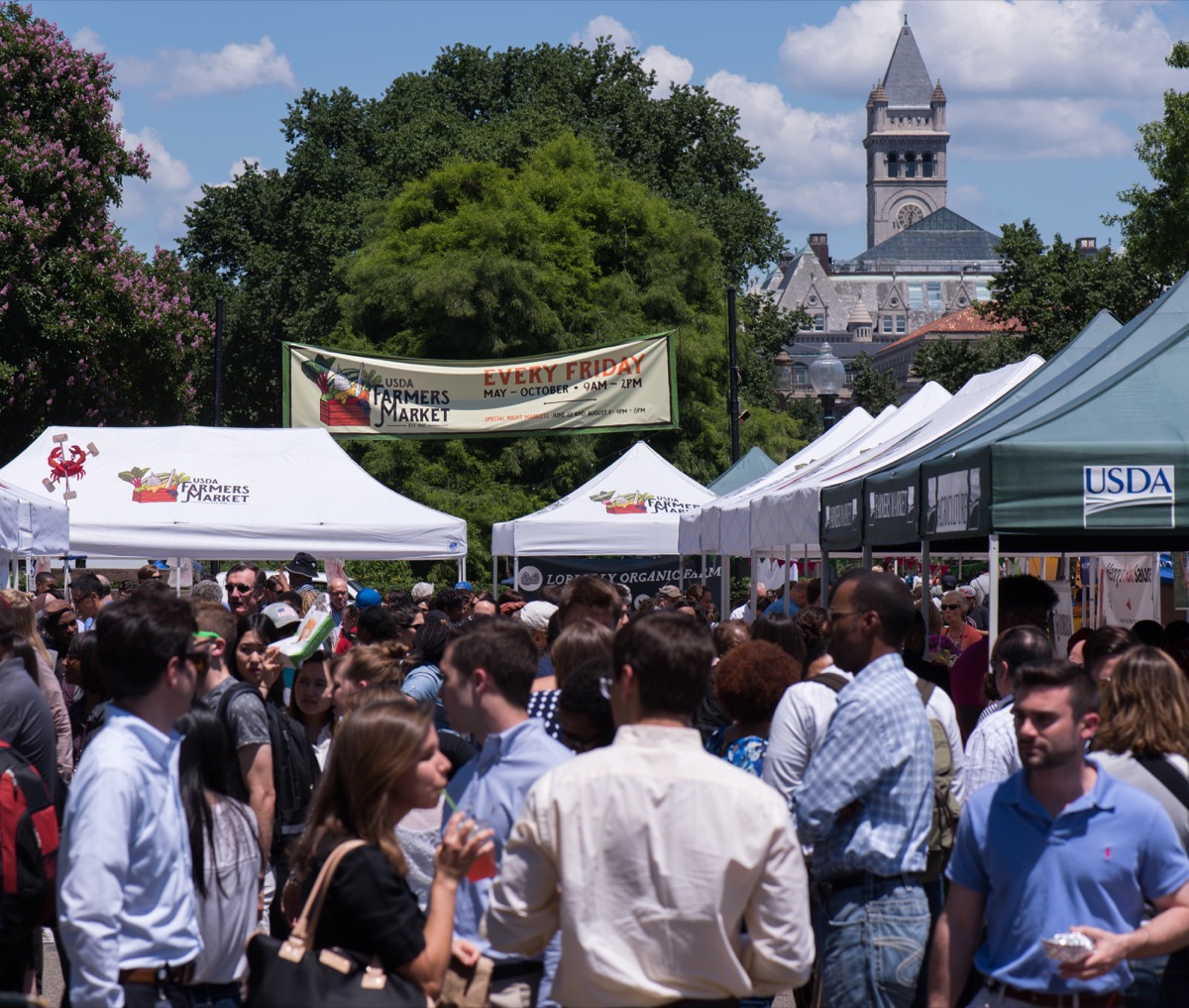 Shoppers and vendors at the USDA Farmers Market in Washington, D.C.